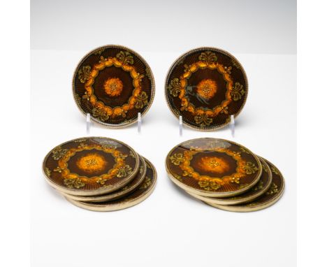 An opulent set of eight round jeweled coasters, by Jay Strongwater, each meticulously crafted with signature decorative flair