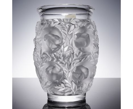 This vase is a fine example of Lalique's masterful crystal craftsmanship, showcasing the Bagatelle design. Originally conceiv