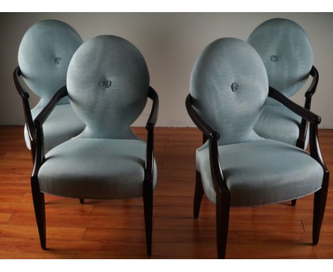 This exceptional set of four lounge armchairs epitomizes the refined elegance that made Angelo Donghia one of America's most 