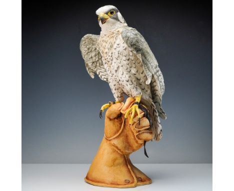 A stunning and lifelike depiction of a Peregrine Falcon from Boehm Porcelain, this Limited Issue sculpture powerfully capture