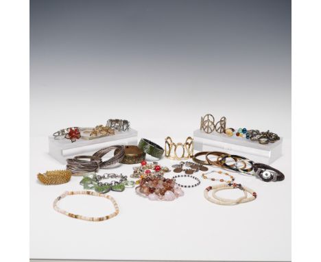 This vibrant and eclectic 30-piece costume jewelry collection features a dynamic variety of materials, colors, and styles, id