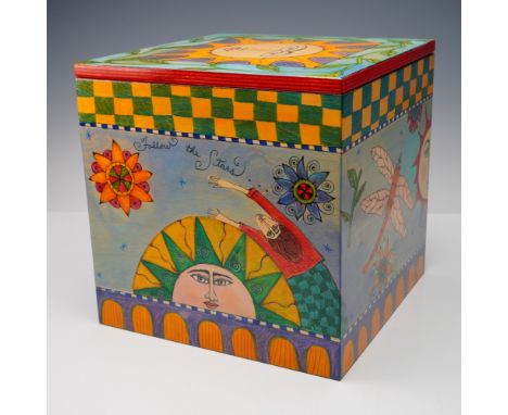 The exterior features vibrant and detailed illustrations on all sides, showcasing Znika's signature folk-art inspired style. 