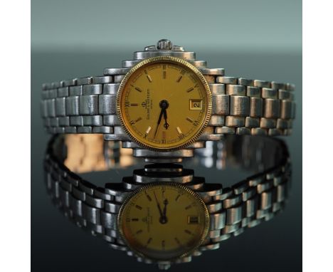 Baume &amp; Mercier luxury ladies wristwatch crafted with a blend of 18kt gold and stainless steel. Featuring a refined  stai