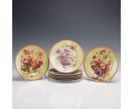 Set of eight French Limoges porcelain plates by French Home, each decorated with colorful floral arrangements in urns against