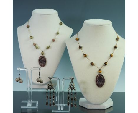 Group of semi precious stone jewelry including two necklaces and two pairs of earrings for pierced ears. One necklace feature