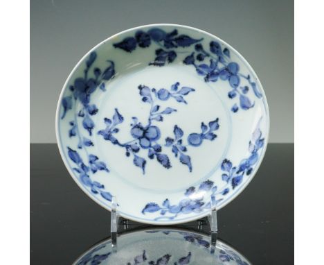 Decorated with underglaze blue floral motifs across the interior and exterior. The interior features a central floral spray e