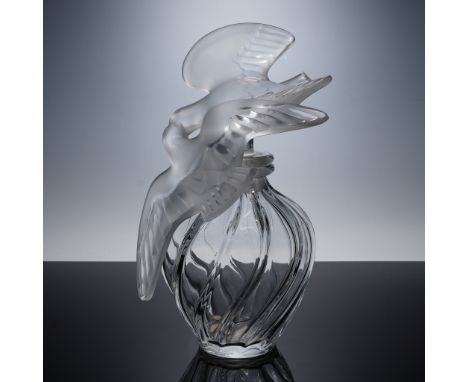 Large Lalique crystal factice perfume bottle featuring a frosted glass stopper with kissing doves and a swirling clear crysta