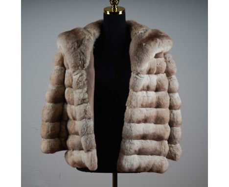 An exquisite vintage  fur jacket as soft as chinchilla in a stunning silver grey palette, crafted by Kneeter Furs of Des Moin