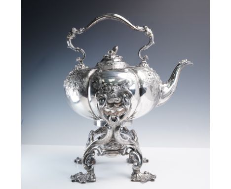 Magnificent Victorian sterling silver tipping kettle on stand with burner. This regal piece features a melon form body with e