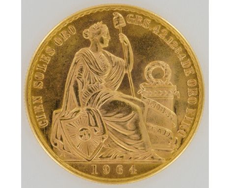 Gold coin from the Republic of Peru, minted in 1964 and housed in a protective slab. The obverse features the national coat o
