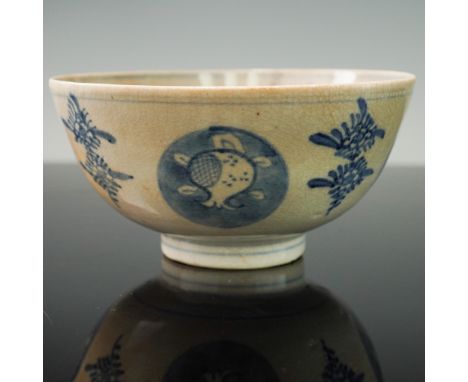 Featuring hand-painted underglaze blue floral and fruit motifs. The exterior of the bowl is decorated with alternating rounde