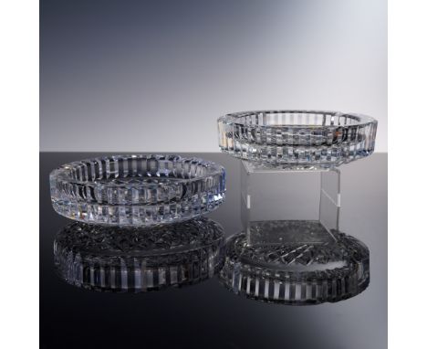 Offered is a pair of elegant Waterford cut crystal ashtrays, each measuring approximately 6 inches in diameter. Featuring ver