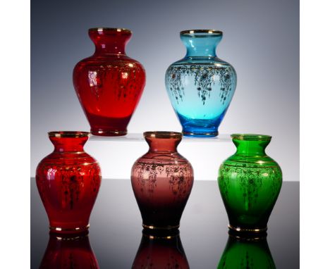 A radiant collection of five blown glass vases, each hand-decorated in the Bohemian style with lavish black enamel scrollwork