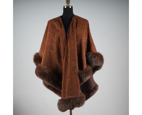 This luxurious Adrienne Landau for Lillie Rubin cape features rich chestnut suede with an elegant floral swirl pattern delica