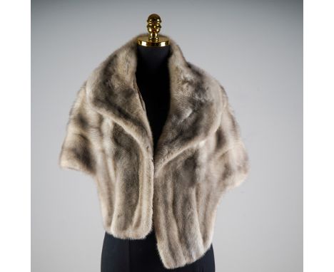 This vintage silver grey mink fur stole by Cronie, a renowned furrier in operation since 1907, showcases the luxury and refin