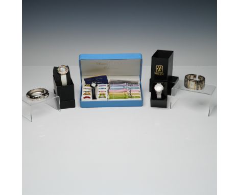 Stylish assortment of five women's wristwatches, featuring a mix of three elegant strap watches and two bold bangle-style des