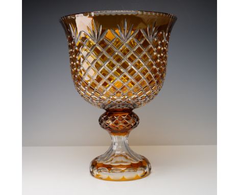 Amber and clear cut glass footed centerpiece with a wide flaring bowl featuring deep crosshatched cuts forming a diamond latt