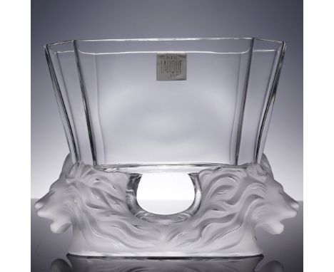 Features two frosted lion head sculptures on either side, seamlessly merging with the clear, geometric bowl. The bowl's body 