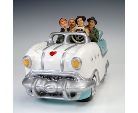 This whimsical I Love Lucy cookie jar features Lucy, Ricky, Fred, and Ethel riding in a vintage convertible, perfectly captur