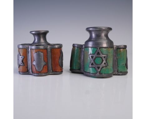 A striking pair of handcrafted Judaica vessels in an organic, six-lobed form, constructed in metal with enamel accents. Each 