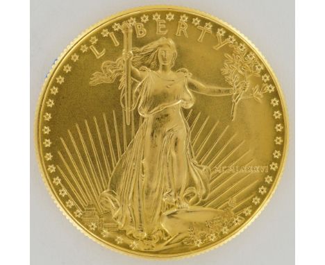 Issued by the United States Mint in 1986, this 1 oz American Gold Eagle bullion coin carries a face value of 50 dollars. The 