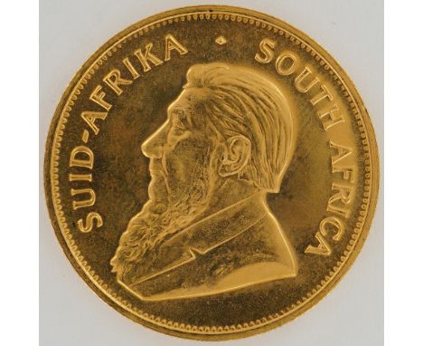 1980 South African Krugerrand containing 1 troy ounce of fine gold, encapsulated in a protective slab. The obverse bears a le
