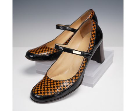 Pair of Louis Vuitton Mary Jane style pumps in the signature Damier Ebene checkerboard pattern. These shoes feature a brown a