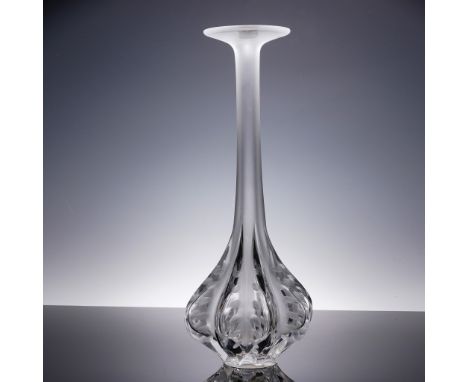 This striking Lalique crystal vase features the elegant Claude pattern, characterized by a fluid, organic form with a flared 