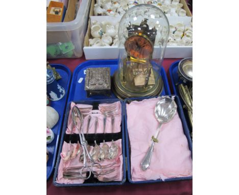 Brass Anniversary Clock Under Glass Dome, (base repair), 27cm high. Japanese soft white metal cigarette box, cased cutlery:- 