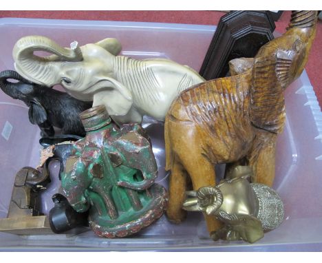 A Carved Wooden Elephant, 43cm high, book ends candlestick and other items all elephant related:- One Box.