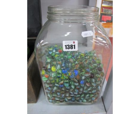 A Very Large Number of XX Century Marbles, (many hundreds) in a vintage glass butter churn jar.
