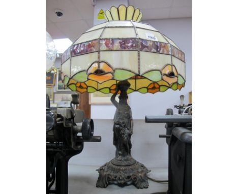 Coppered Figural Table Lamp, having Tiffany style shade, 56cm high.