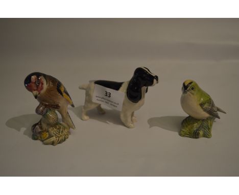 Two Beswick Birds "Goldcrest" and "Goldfinch" and a Beswick Dog 