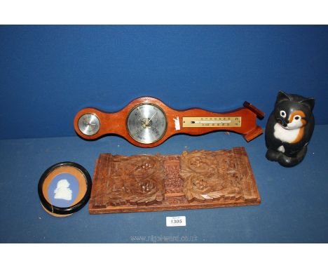 A small quantity of miscellanea including barometer, Treen cat and book rack, and blue Jasperware silhouette