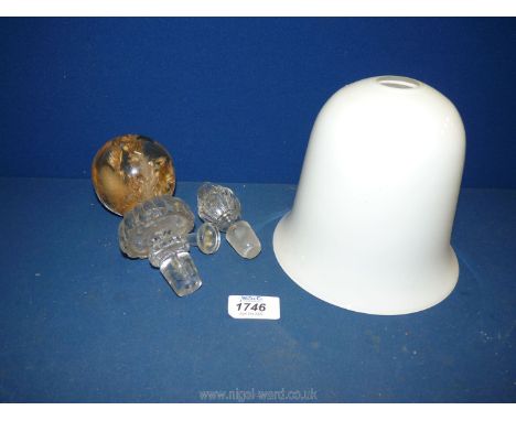An opaque glass lamp shade , decanter stoppers etc