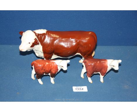 A Beswick Hereford Bull (nose ring glued) and two Beswick Hereford calves (one a/f).