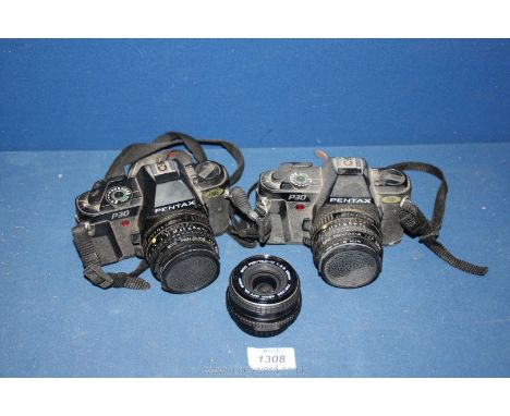 Two Pentax P30 35mm SLR Cameras both with Pentax SMC 50mm f/1.7 Lenses and lanyards together with an SMC Pentax-M 28mm f/2.8 