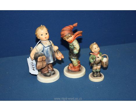 A Goebel figure Boots boy 1960-75, 5" tall, a similar March Winds figure 1972-79 and a smaller village boy figure 1960-72, 3 