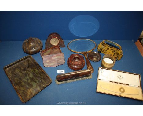 A quantity of faux Tortoiseshell dressing table items including mirror, clock, brush, pot, etc, some a/f.