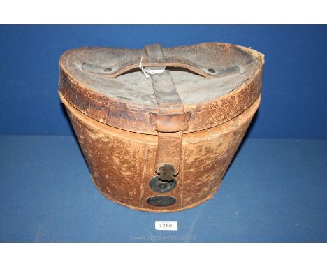 A vintage leather Top Hat box.