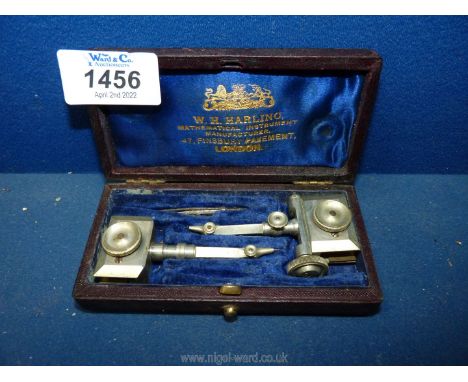 A black leather bound case containing high quality Nickel fittings for a wooden beam setting-out compass and with lead holder