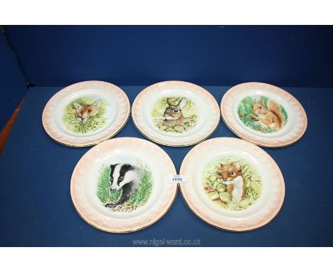 Five Royal Worcester Co. Palissy plates featuring embossed figures of a fox, badger, rabbit, etc.