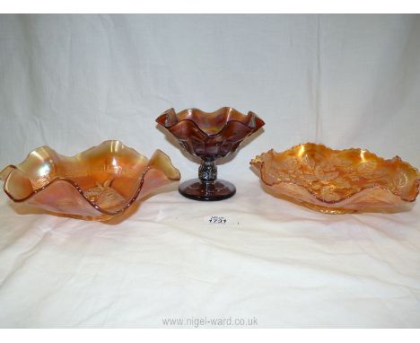 A vintage iridescent 'Peacock and Urn' carnival glass ruffled bowl by Millersburg, 9" wide x 2 1/2" tall, together with an ir