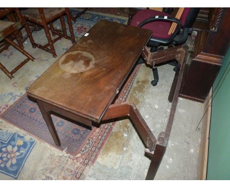 A Walnut/Mahogany flap-over, concertina action, Card Table having green baize top and standing on moulded square legs, 36'' x