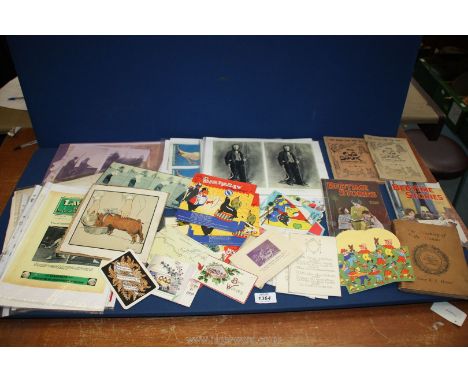 A box of assorted Arts and Crafts, Louis Wain pictures, sports photographs, advertising logos, early golf, tennis, shooting e