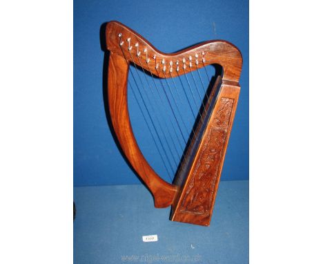 A twelve string Folk Harp in case