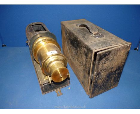 A heavy iron cased triple wick Magic Lantern of good quality with brass fittings and blue side lighting and with swivel actio