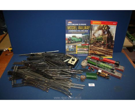 A quantity of '00' gauge track, Flying Scotsman and Duchess on stands, Brighton Steam engine , controller etc.