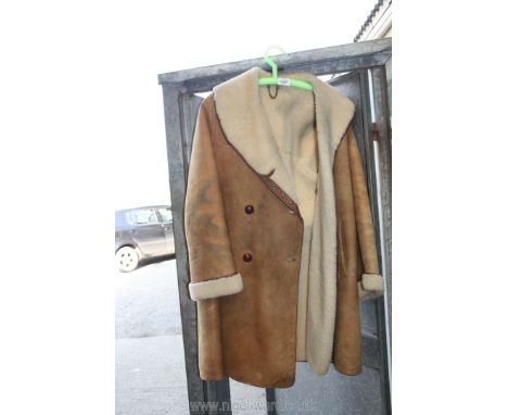 A beige suede and sheepskin double breasted car Coat by Morlands of Glastonbury, large size, (one button missing).