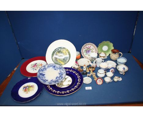 A quantity of china to include; Royal Worcester display plates, Wade Whimsies, souvenir cups &amp; saucers, etc.